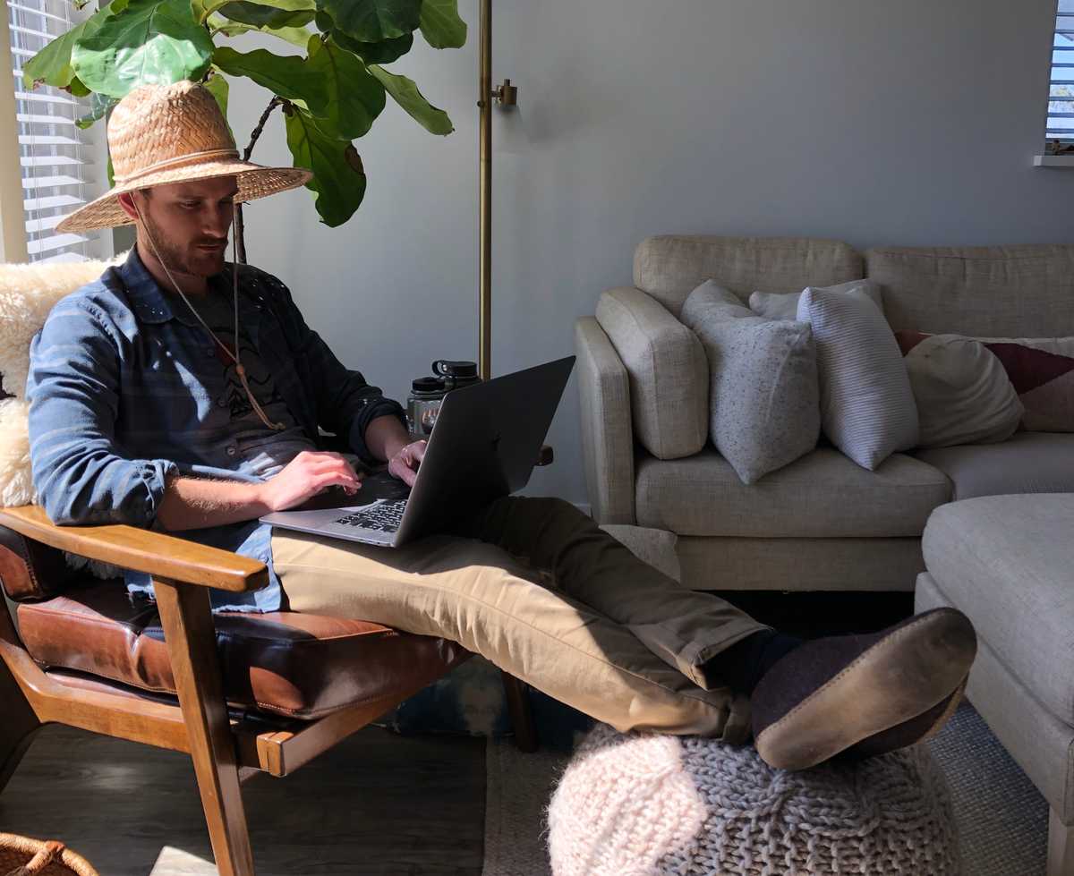 Zach coding in the sun